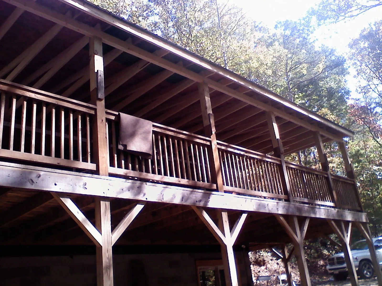 Timber framing under a new elevated porch and deck — Roof Leak Repair in Prospect Hill by Roofing Brothers